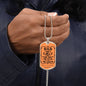 Personalized dog tag for dad, featuring the text "The Man with the Legend."