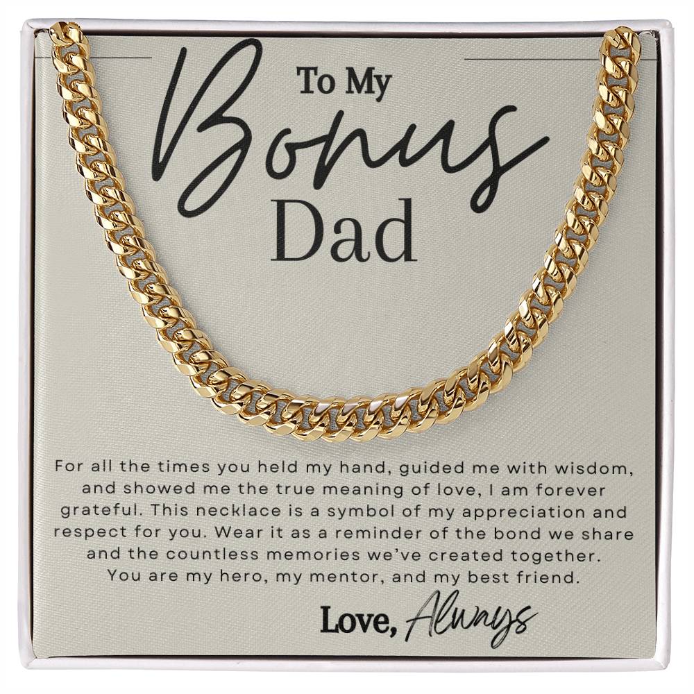 Gold chain necklace with message that reads "to my bonus dad" in elegant script font.