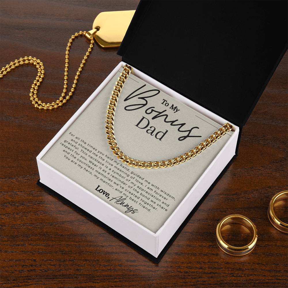 Gold chain necklace with message that reads "to my bonus dad" in elegant script font.