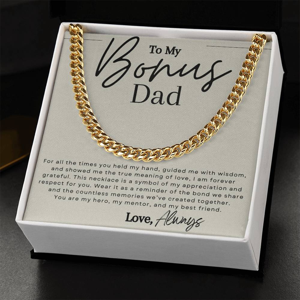 Gold chain necklace with message that reads "to my bonus dad" in elegant script font.
