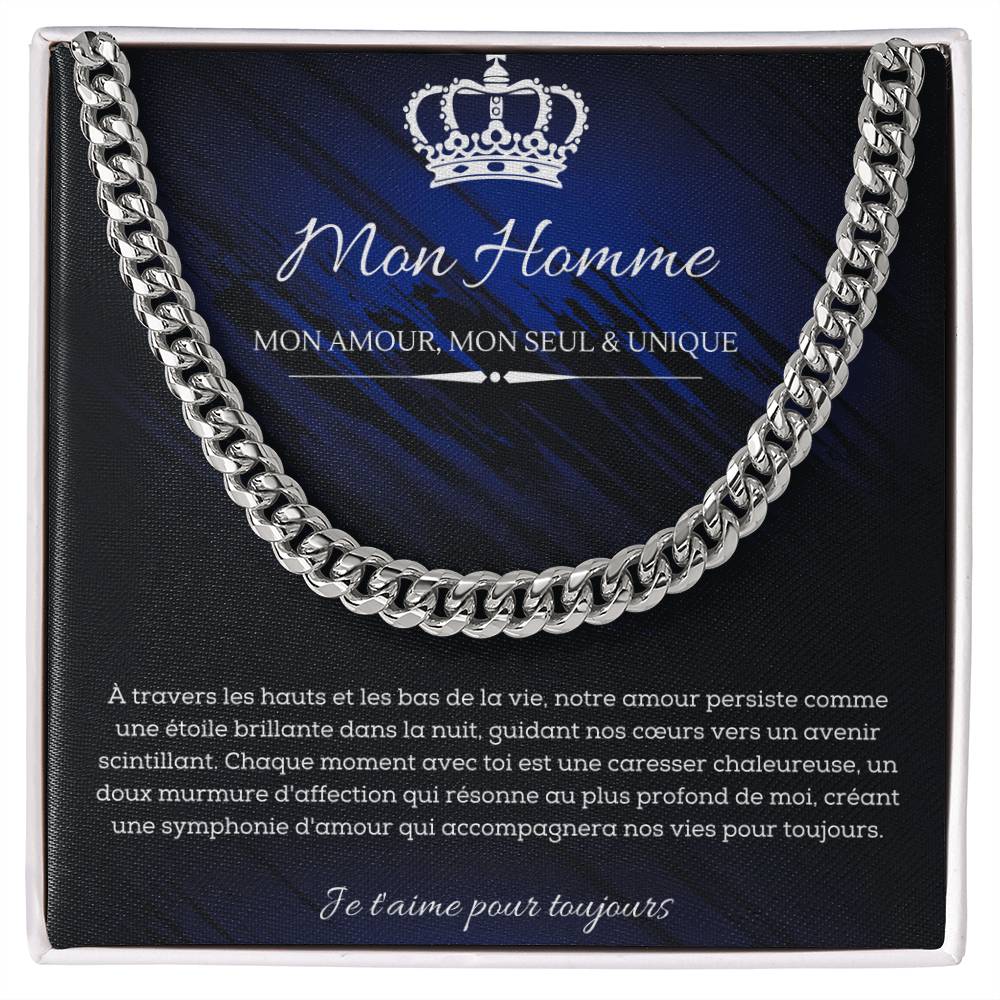 A polished metallic chain necklace on a dark blue and black background with French text detailing a romantic message for my man.