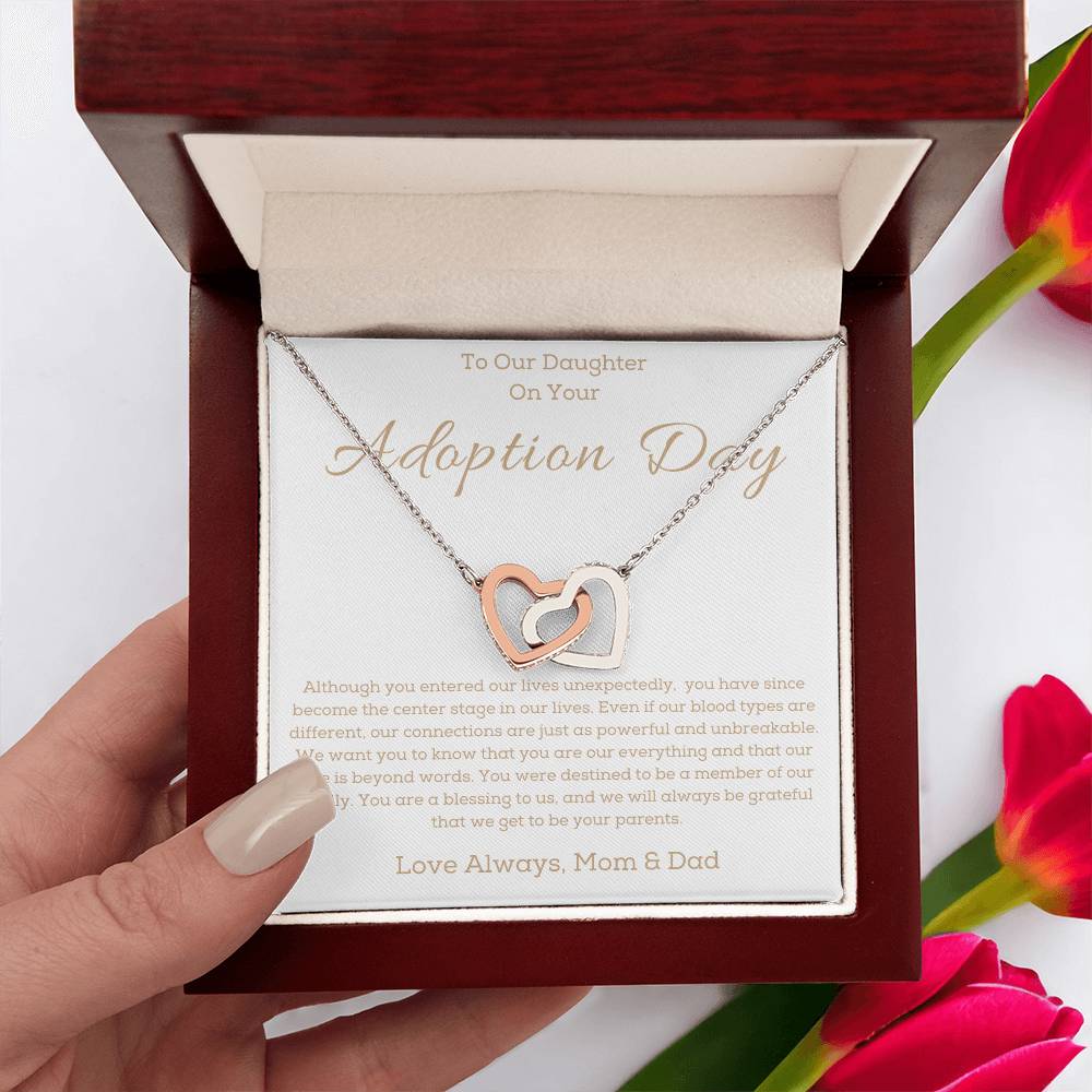 a necklace in a box for a girl on her adotion day