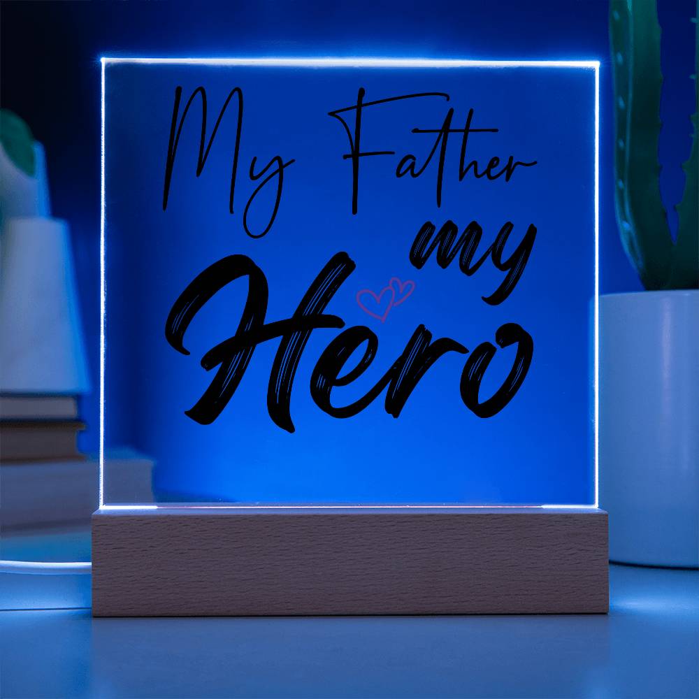 A square glass plaque on a wooden base with text reading "My Father my Hero" and a small red heart design, making it the perfect bestdad gift for Father's Day.