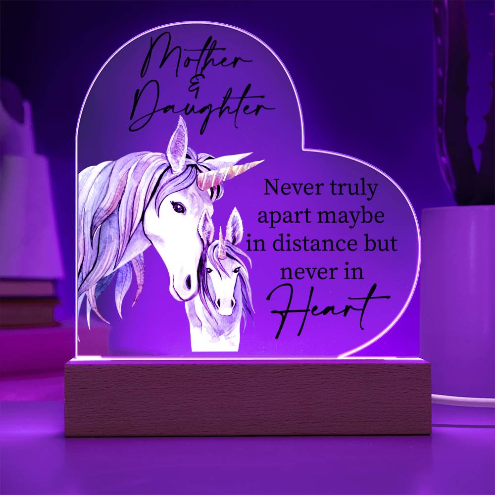 a purple light with a picture of a unicorn on it