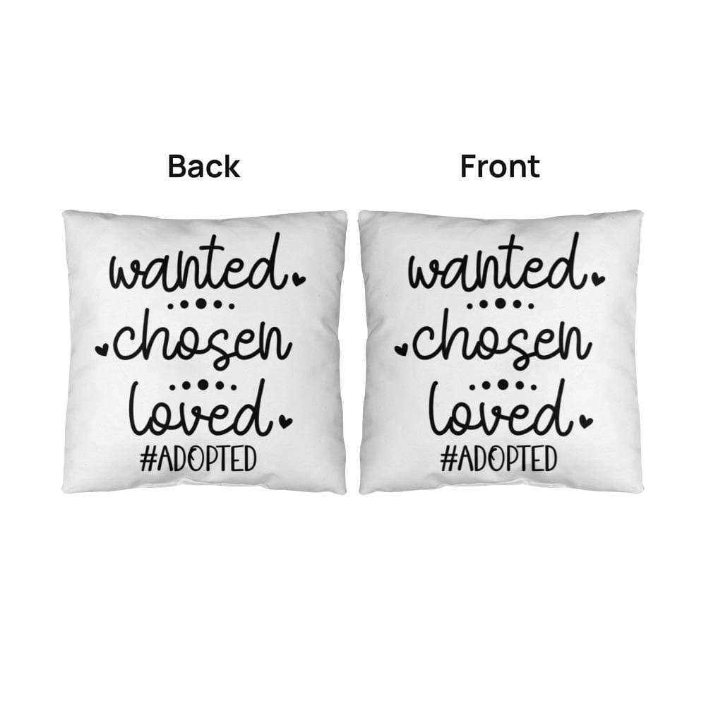 two white pillows with black lettering on them