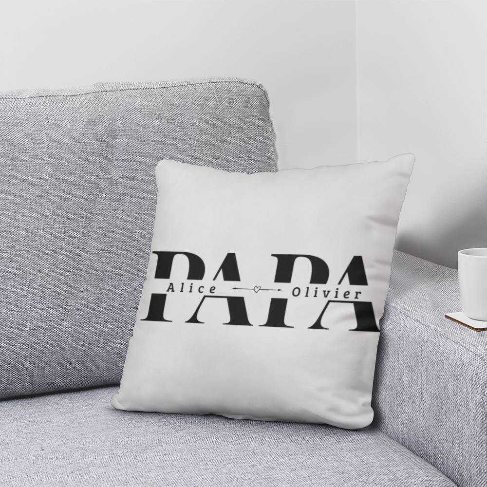 a white pillow sitting on top of a couch