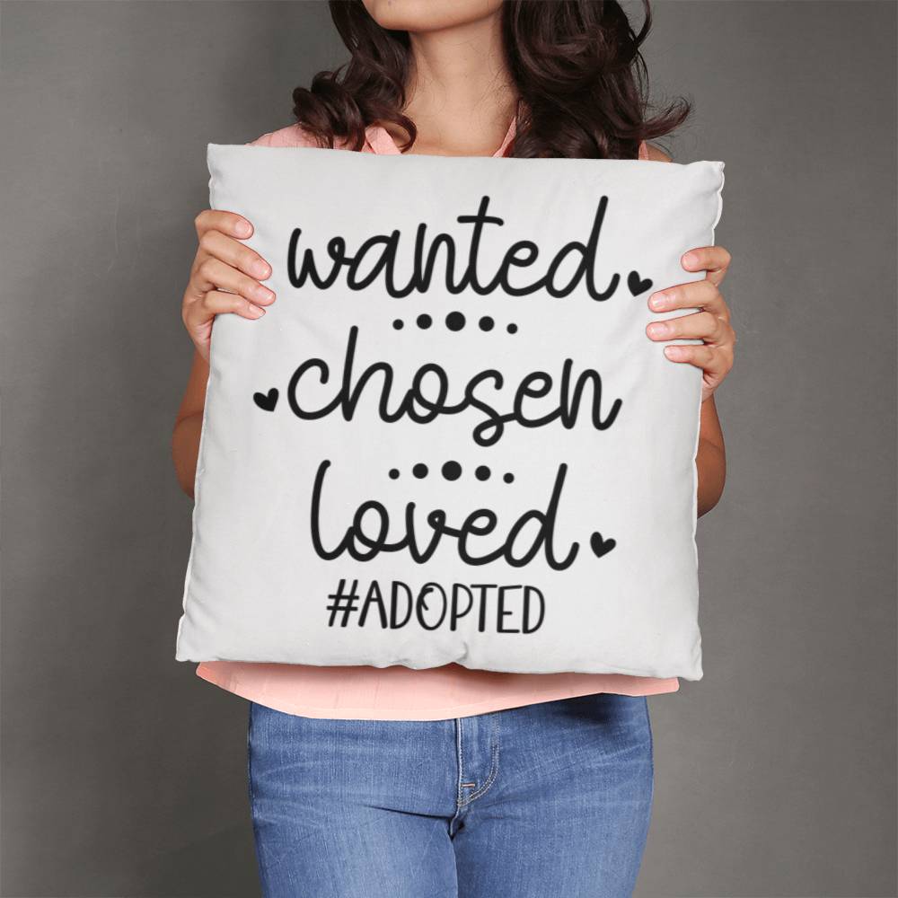 a woman holding a pillow that says wanted chosen lived adopted