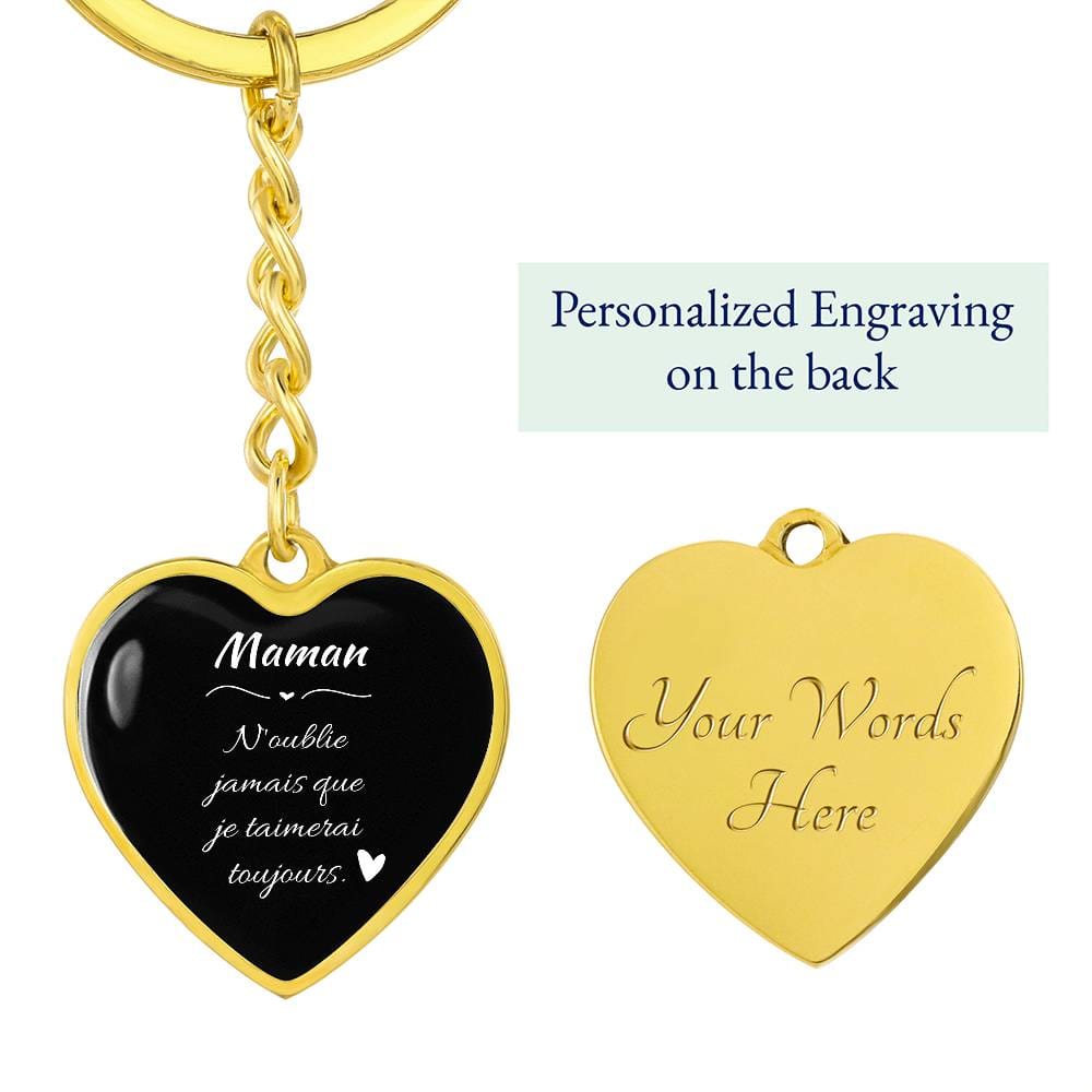 a heart shaped key chain with a personalized engraving on the back