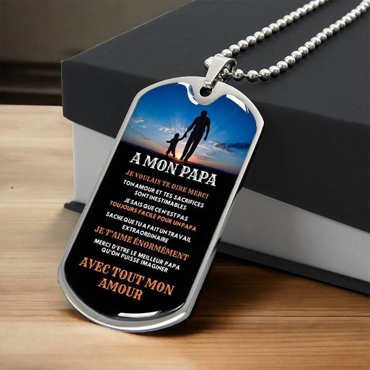 A dog tag bearing the words "mon papa" - a heartfelt gift idea for dad.