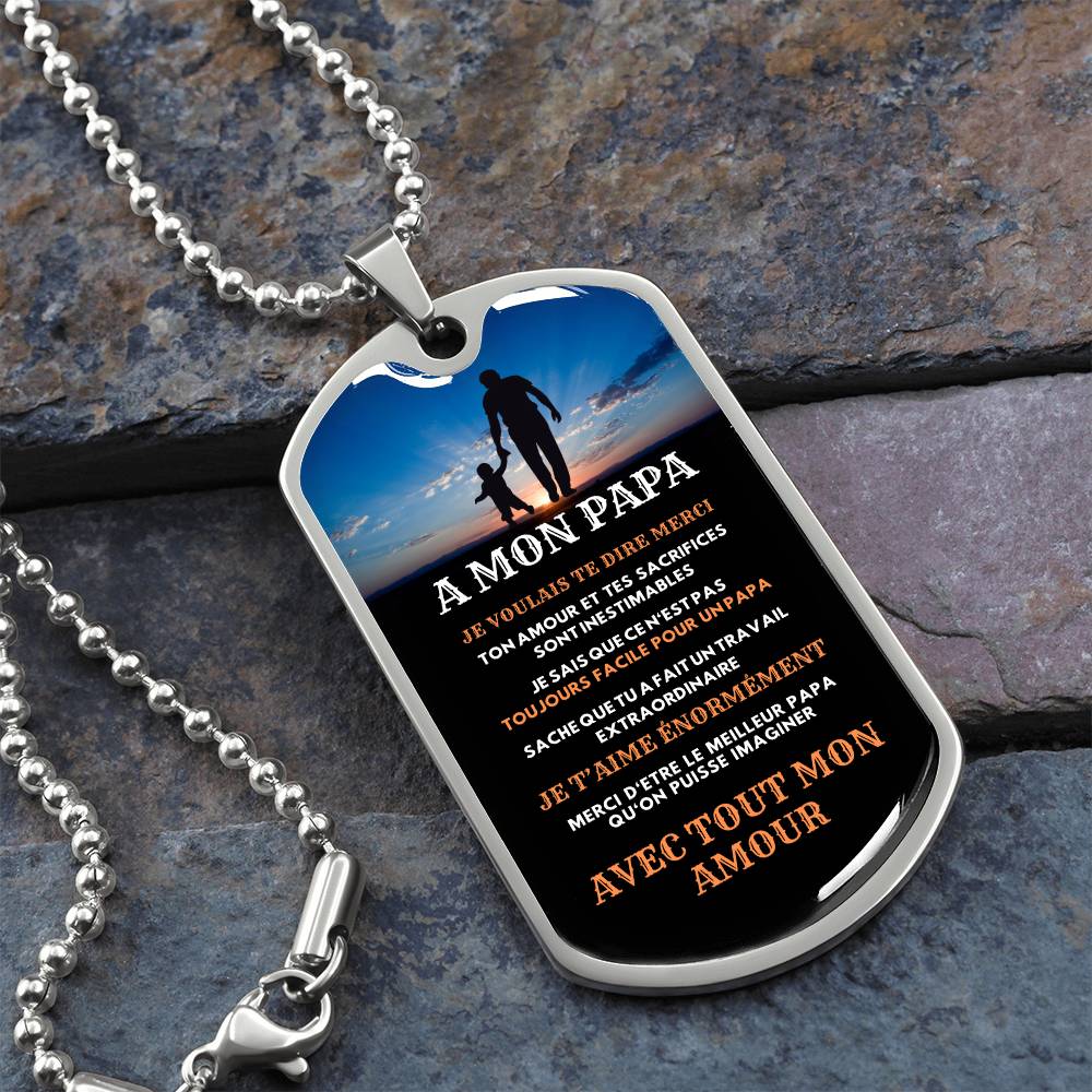 A dog tag bearing the words "mon papa" - a heartfelt gift idea for dad.