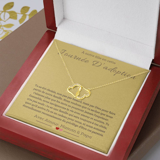 A boxwith goldhearts tide together in 10k gold for adotion gift for daughter