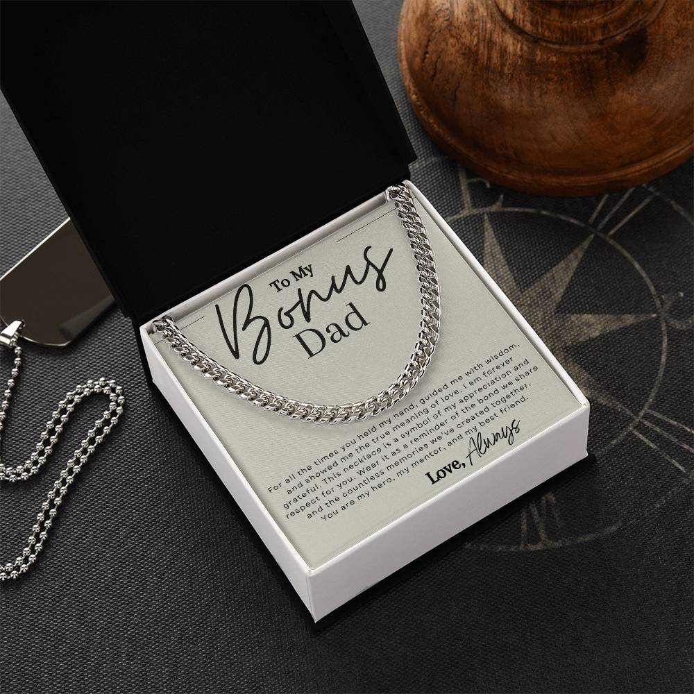 Silver chain necklace with message that reads "to my bonus dad" in elegant script font.