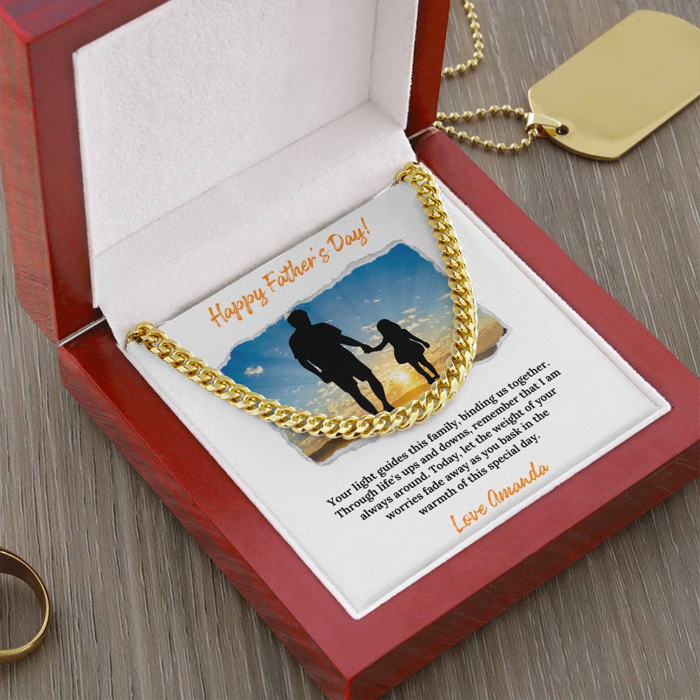 a necklace with a picture of two people holding hands