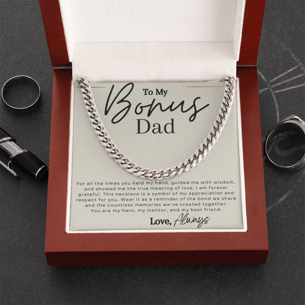 Silver chain necklace with message that reads "to my bonus dad" in elegant script font.