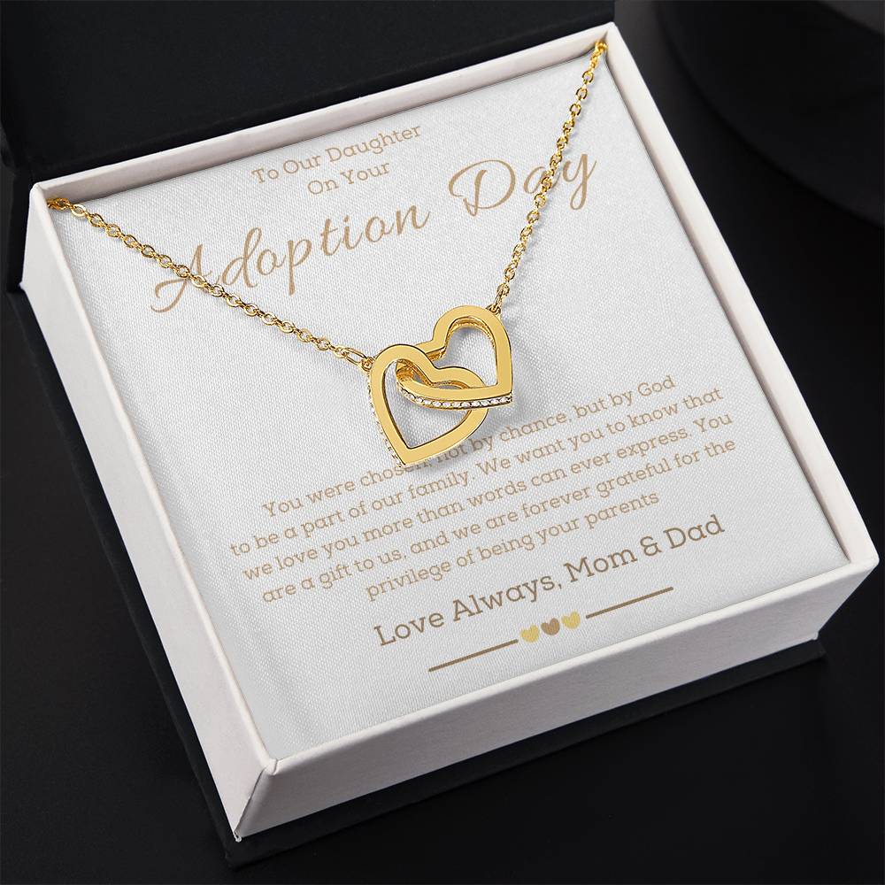 a necklace with two hearts in the middle of it and a message for adoption dedicate to a girl