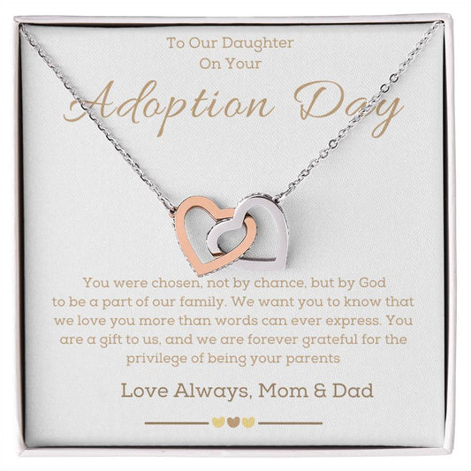 a necklace with two hearts in the middle of it and a message for adoption dedicate to a girl