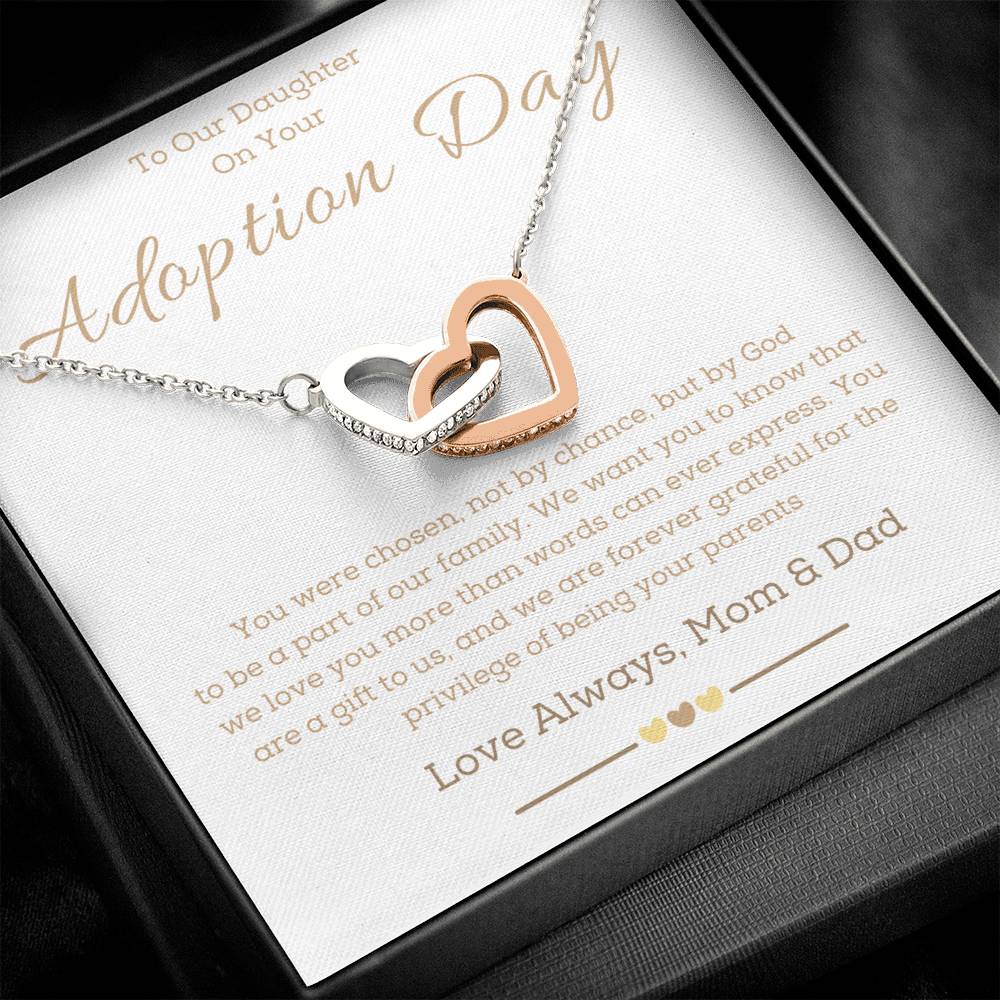 a necklace with two hearts in the middle of it and a message for adoption dedicate to a girl