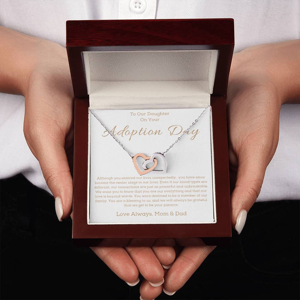 a necklace in a box for a girl on her adotion day