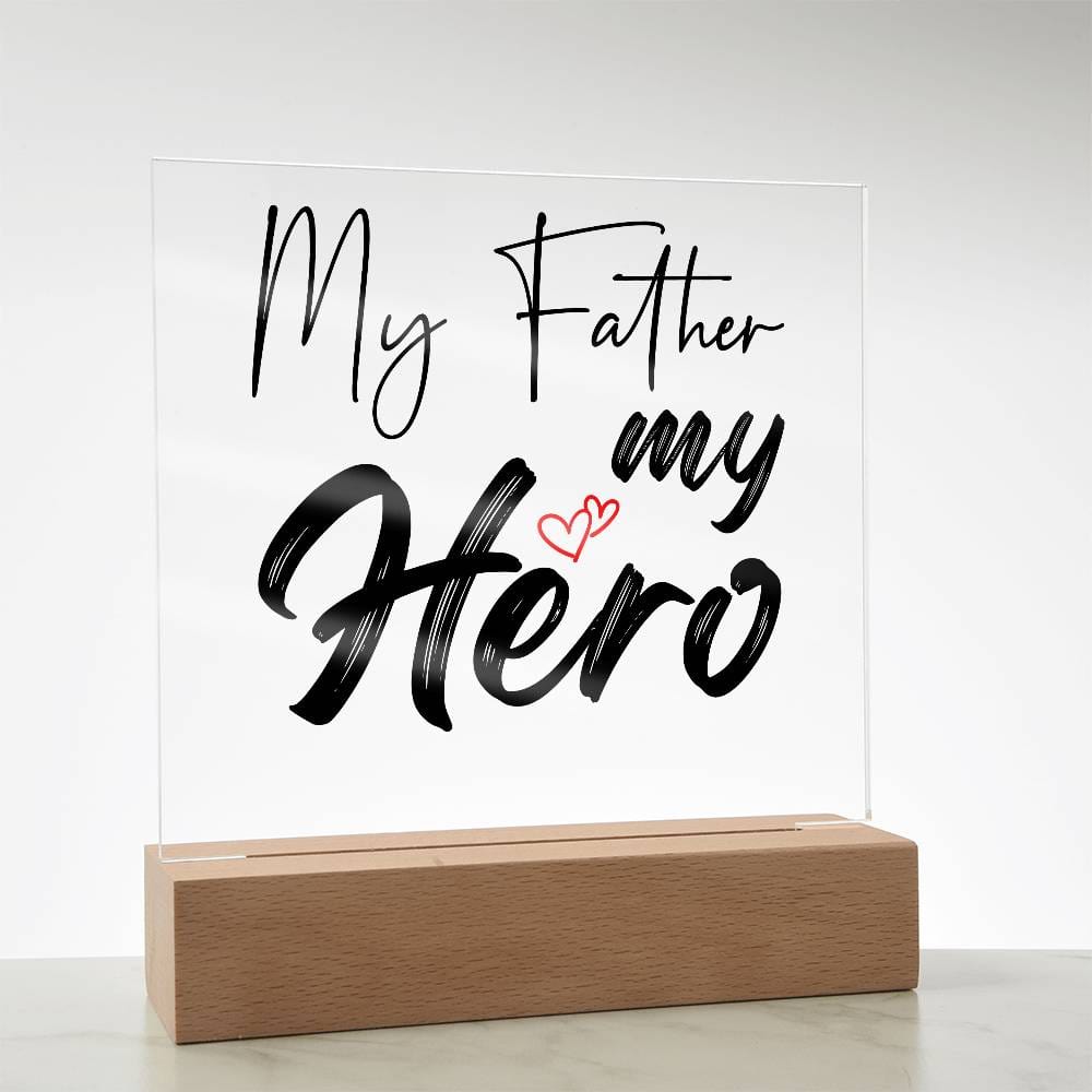 A square glass plaque on a wooden base with text reading "My Father my Hero" and a small red heart design, making it the perfect bestdad gift for Father's Day.