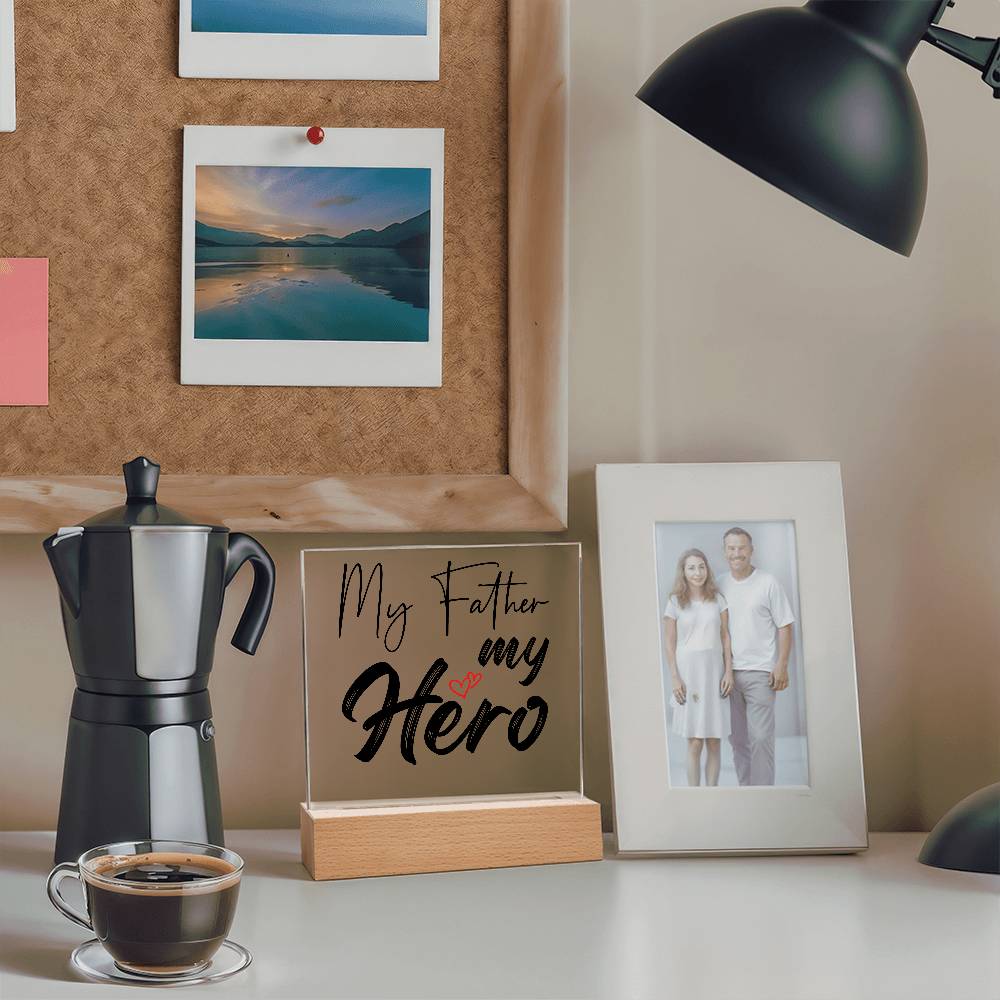 A square glass plaque on a wooden base with text reading "My Father my Hero" and a small red heart design, making it the perfect bestdad gift for Father's Day.