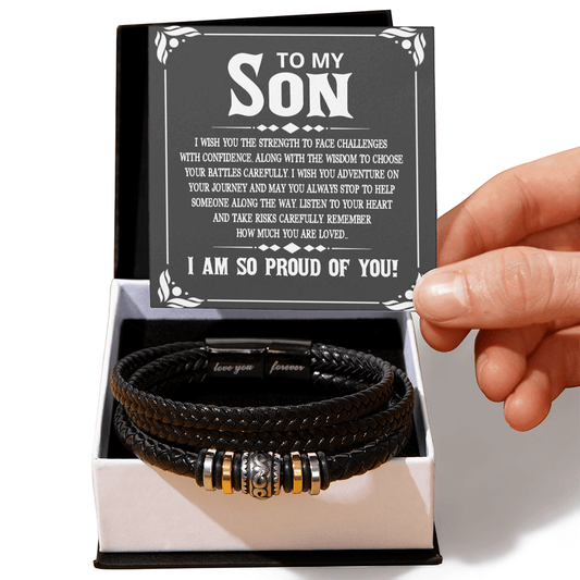 Black leather bracelet with gold and silver accents in a box with a message card for a son.