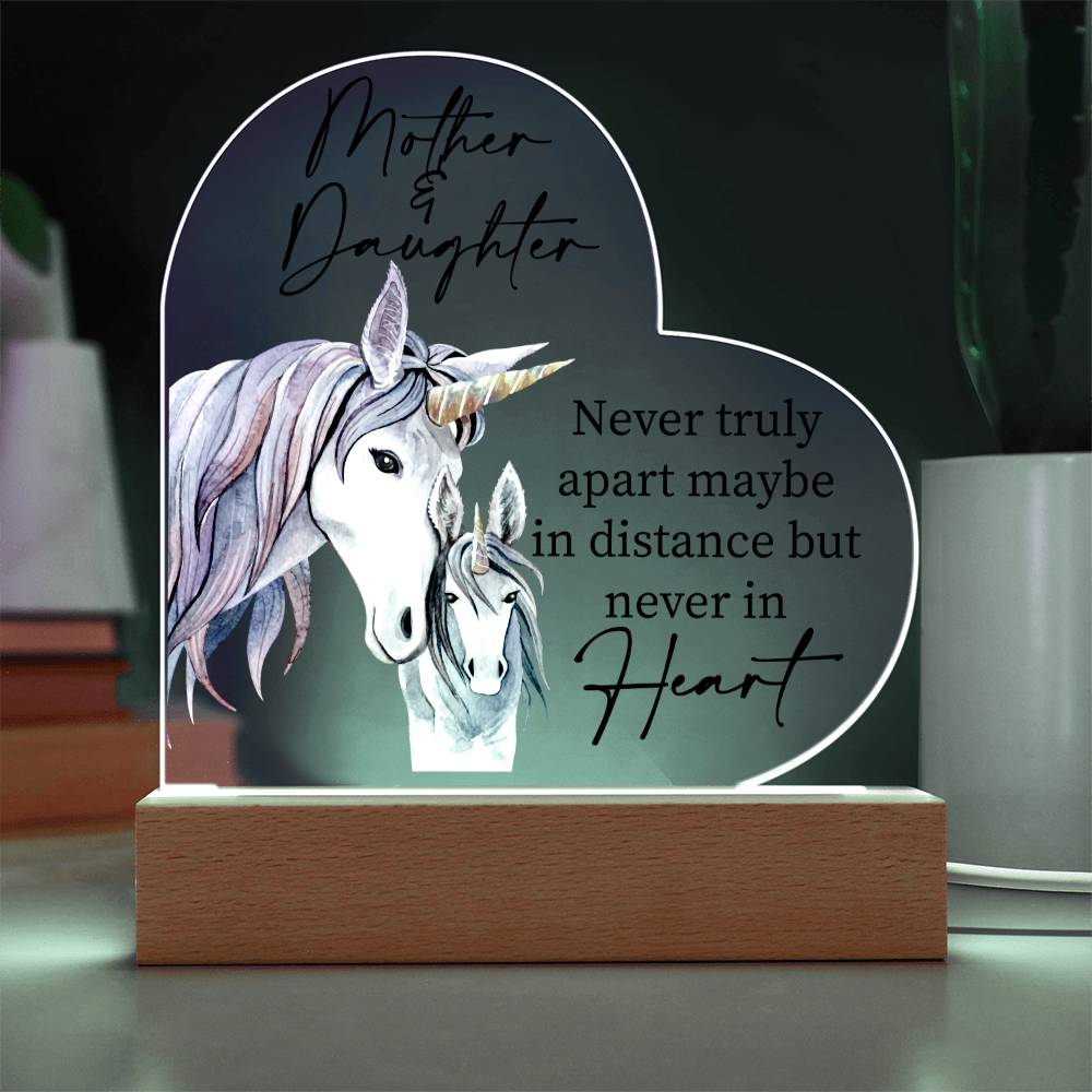 a wooden plaque with a picture of a horse on it